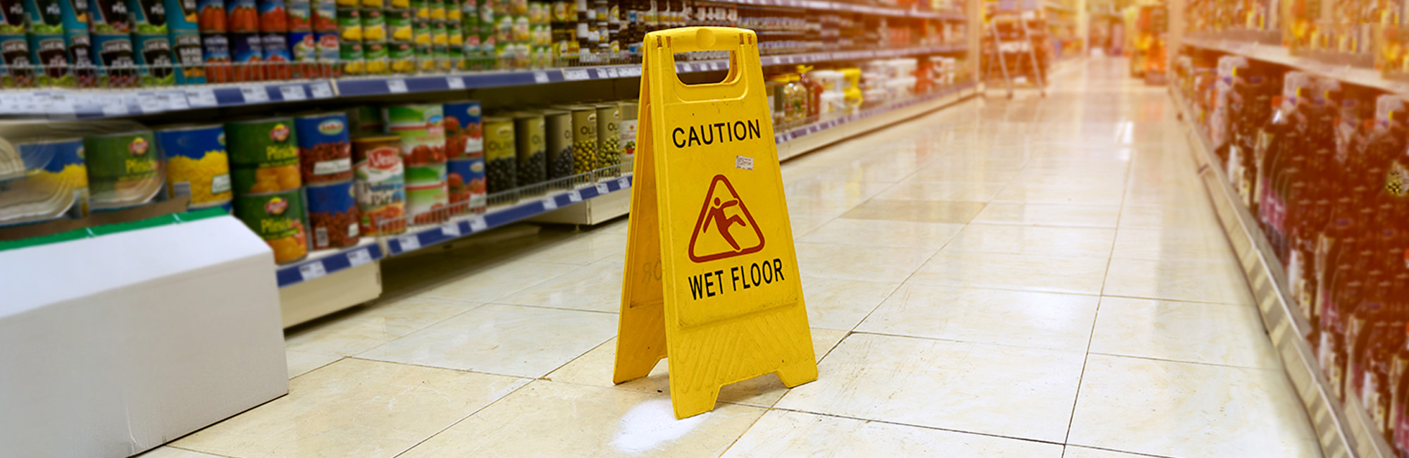 slippery floor sign grocery store